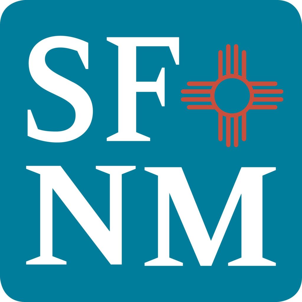 The Santa Fe New Mexican logo featuring white text reading SFNM on medium blue with an orange Zia sun sign design as appears on the New Mexico state flag